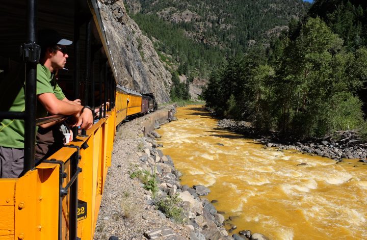 D&SNG RR on Animas River during Gold King Mine Spill, photo by Mor on Flickr, CC BY-NC 2.0
