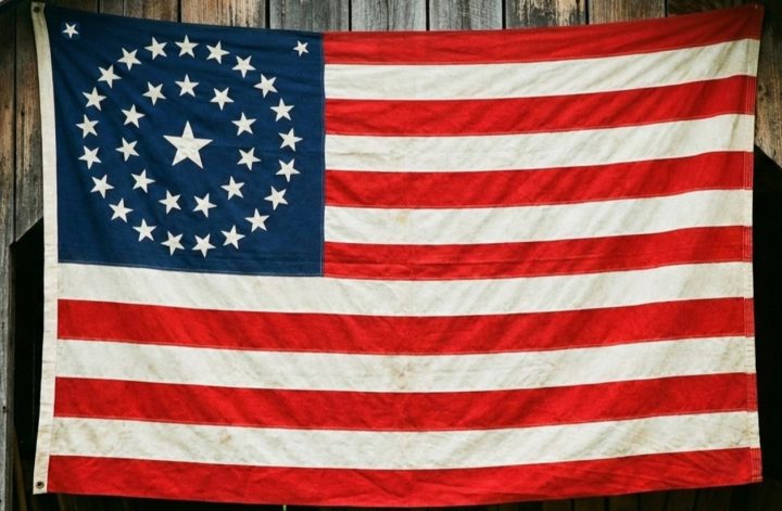 35-star flag on barn