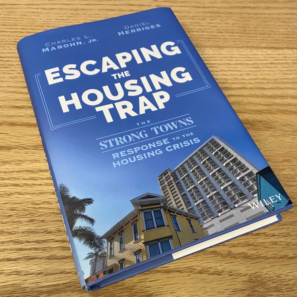Cover of Escaping the Housing Trap: the Strong Towns Response to the Housing Crisis by Charles L. Marohn, Jr., and Daniel Herriges